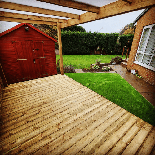 wooden decking area with wooden canopy