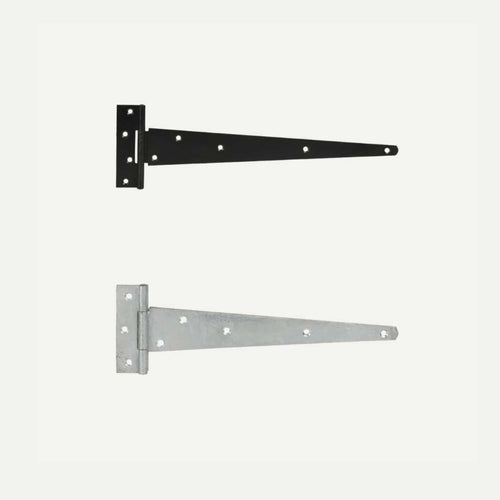 Two Henry Shaw Medium T Hinges, one powder-coated black and the other in galvanized silver. Each hinge features a rectangular plate with multiple screw holes and a tapered arm extending to the right. Perfect for gate ironmongery, they create a striking contrast against the light gray background.