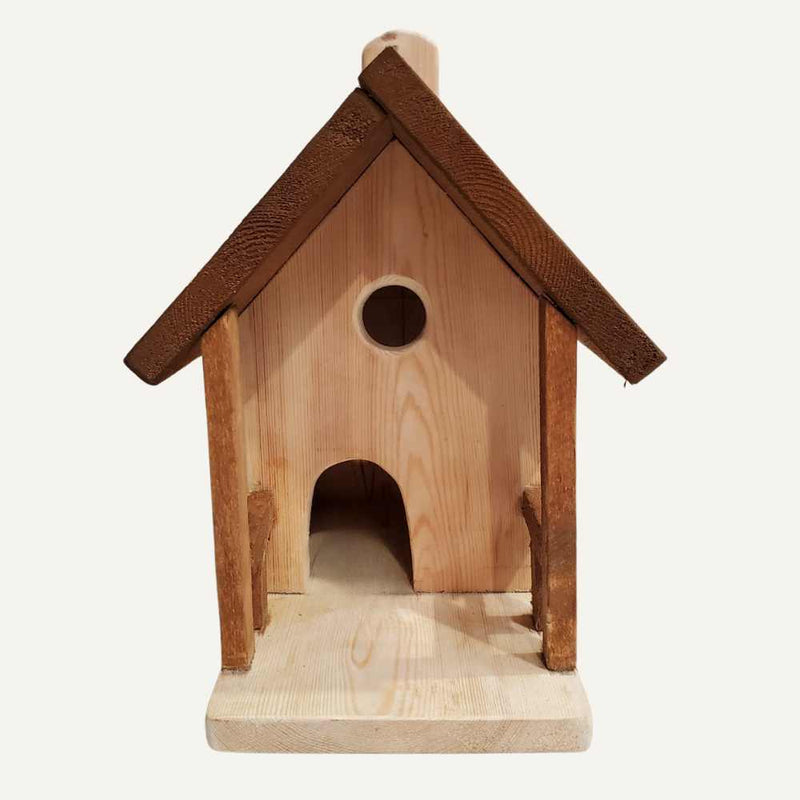 Load image into Gallery viewer, The Bingley Fencing Bird House is a handmade wood piece with a pitched roof, round entrance above an arched opening, and flat base, all in natural tones.