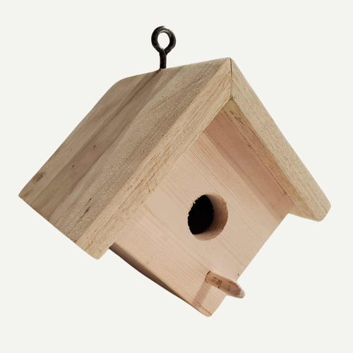 The Bingley Fencing Small Bird House features an apex roof, a small circular entrance with perch, and hangs securely by a metal hook.