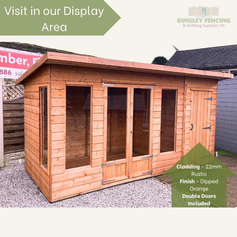 Load image into Gallery viewer, Bingley Fencings Shed-Summerhouse Combination on gravel features 22mm rustic cladding, a dipped orange finish, and double doors. Ideal for storage, it invites you to Visit in our Display Area.