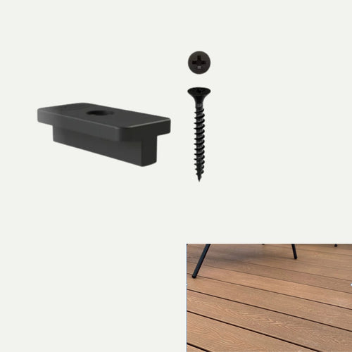 A section of composite decking boards is fastened with Valdern Intermediate Composite Decking Clips Fixings (6mm gap, black screws, bag of 50), with a black clip and screw visible and part of a furniture leg shown on the decking.