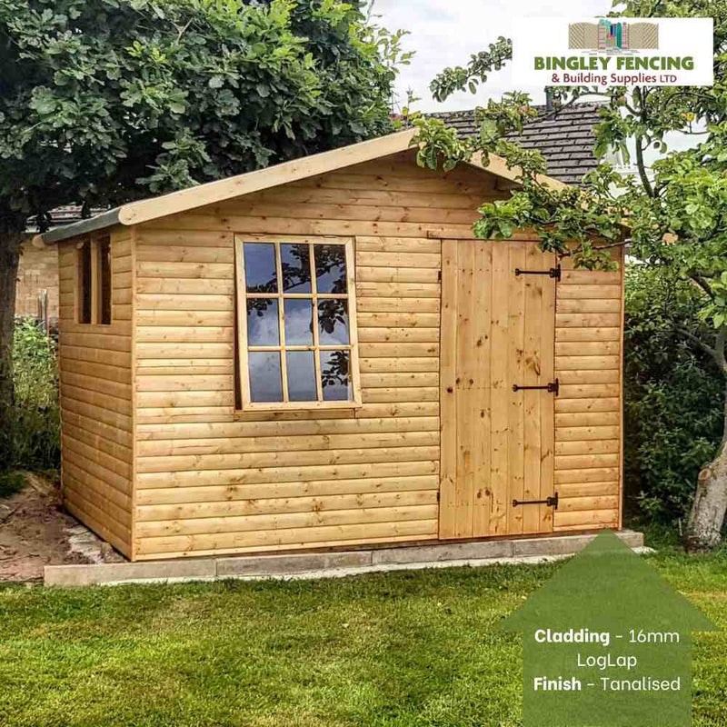 Load image into Gallery viewer, Nestled amid lush greenery, the charming Country Cabin Shed from Bingley Fencing boasts a pitched roof and features a Georgian window alongside a single door. This structure is crafted with 16mm LogLap cladding and tanalised for durability, proudly showcasing the Bingley Fencing logo.