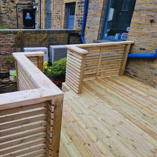Garden decking areas with privacy slats for balustrade