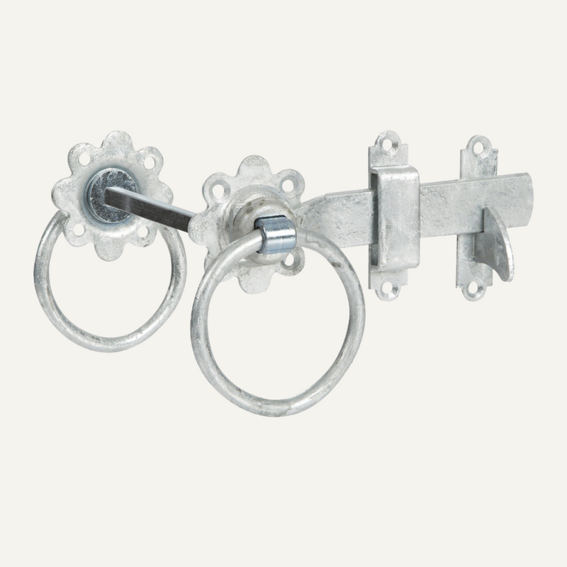Load image into Gallery viewer, A Henry Shaw Ring Gate Latch, available in a 6" size in either black or galvanised finish, features two circular rings and floral-shaped metal plates crafted in a traditional ironmongery style. Designed to secure doors or gates with a right-side bolt, this latch is elegantly displayed against a plain white background.