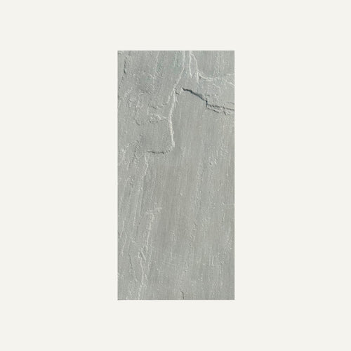 The Kandla Grey Indian Sandstone Individual Paving Slabs by Bingley Fencing feature a textured, natural-looking veined surface in rectangular gray stone, perfect for grey patio paving, shown here on a plain white background.