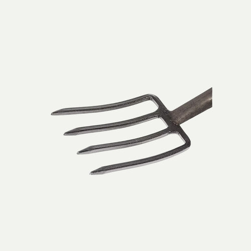 Four-pronged metal head of a Roughneck Micro Fork 29″.