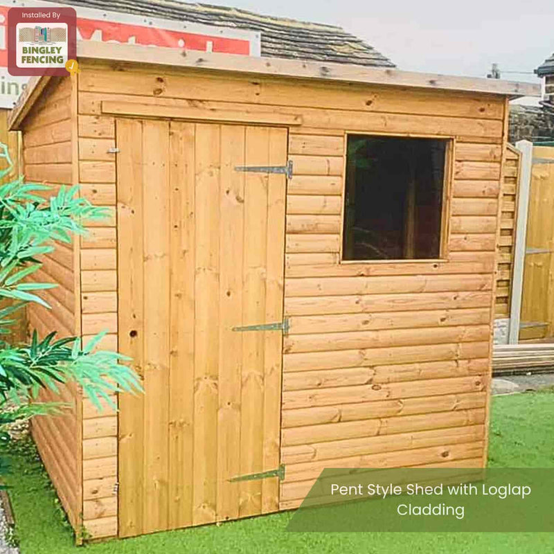 Load image into Gallery viewer, A shed built with Loglap Cladding Boards (various thicknesses) by Bingley Fencing features a single door, window, artificial grass base, nearby plant, and a sign: Installed by Bingley Fencing.