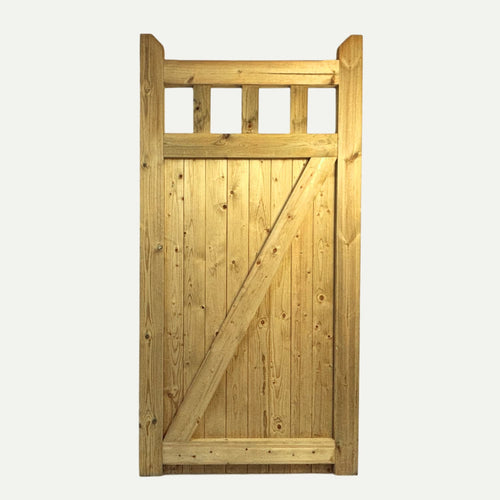 The KDM Regency Euro-Gate is crafted from pressure treated timber with vertical planks, three square top windows, and strong diagonal and horizontal support beams.