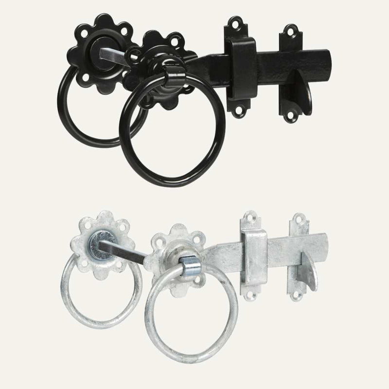 Load image into Gallery viewer, Two vintage-style door latches are displayed. The top latch, reminiscent of classic ironmongery, is the Henry Shaw Ring Gate Latch 6" in black with a round handle. The lower latch resembles a traditional gate fixture and is the galvanised version of the same Henry Shaw model, featuring the identical round handle. Both include decorative backplates with matching circular patterns.