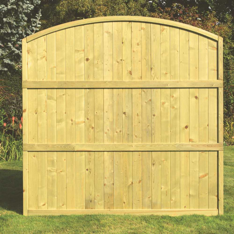 Load image into Gallery viewer, The KDM Arched Tongue & Groove Fence Panel (TGA180) features a tall, curved-top wooden design with vertical planks and horizontal supports—perfect for boosting privacy in your garden or lawn surrounded by greenery.