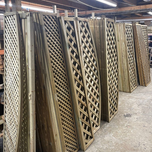 Internal shot of Bingley fencing warehouse showing large stacks of trellis panels