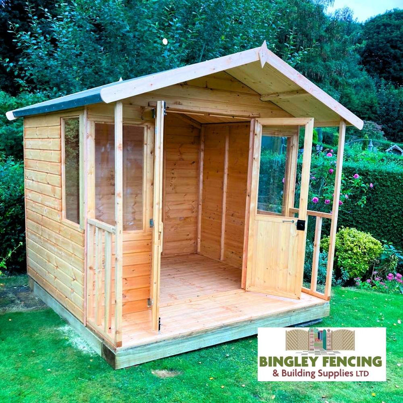 Load image into Gallery viewer, An Apex Summerhouse, from Bingley Fencing, stands with an open front door on a grass lawn. Featuring glass panels flanking the entrance, this made-to-order wooden summerhouse is perfect for any garden. The logo for Bingley Fencing & Building Supplies LTD is in the bottom right corner.