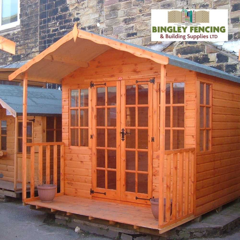 Load image into Gallery viewer, The Georgian Summerhouse, crafted by Bingley Fencing, showcases a quaint porch with two potted plants adorning the entrance. It features expansive glass-paneled doors and a pitched roof, perfectly capturing the essence of garden living. The top right corner is adorned with the logo of Bingley Fencing & Building Supplies LTD.