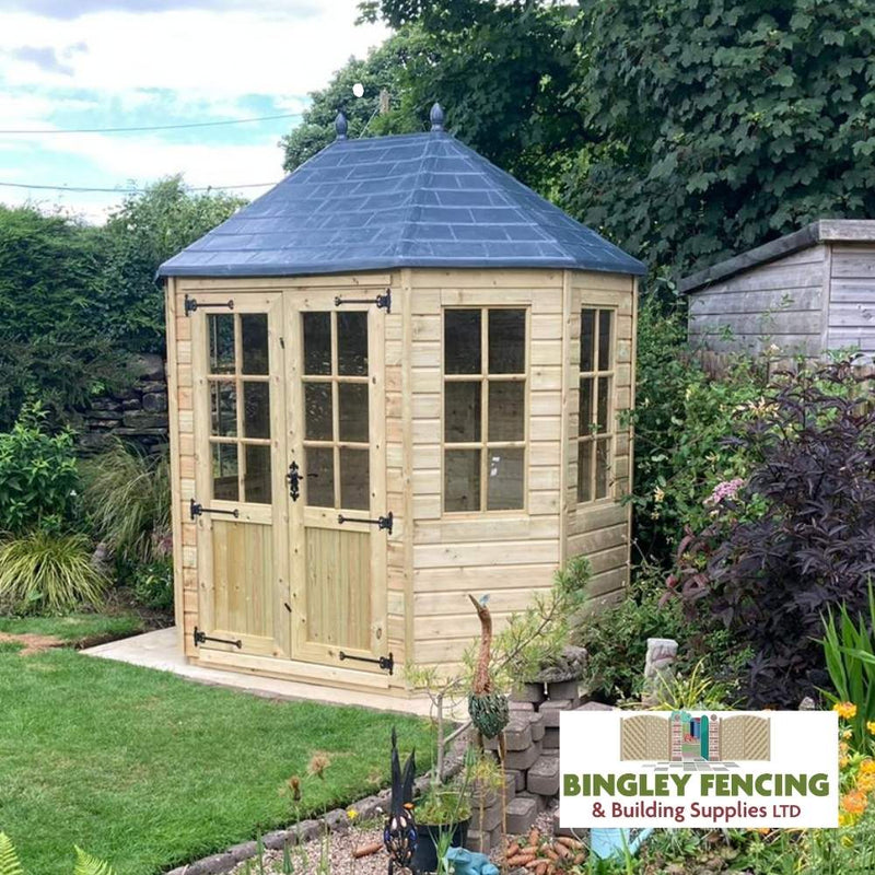 Load image into Gallery viewer, An Octagonal Summerhouse by Bingley Fencing sits in a garden surrounded by greenery, featuring Georgian windows and double doors. The small wooden gazebo with a dark roof includes the Bingley Fencing & Building Supplies LTD logo in the bottom right corner.