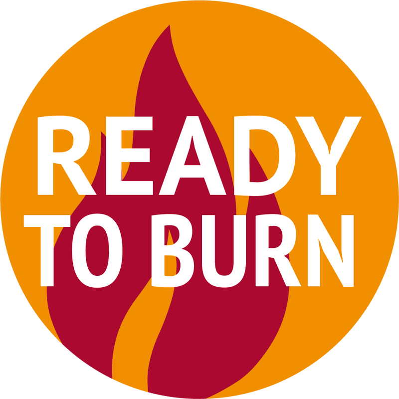 Load image into Gallery viewer, A circular logo with an orange background showcases a red flame graphic, representing clean burning. Over the flame, bold white text states "Newburn 25KG Smokeless Coal - Premium" by Bingley Fencing, highlighting its low emission qualities.