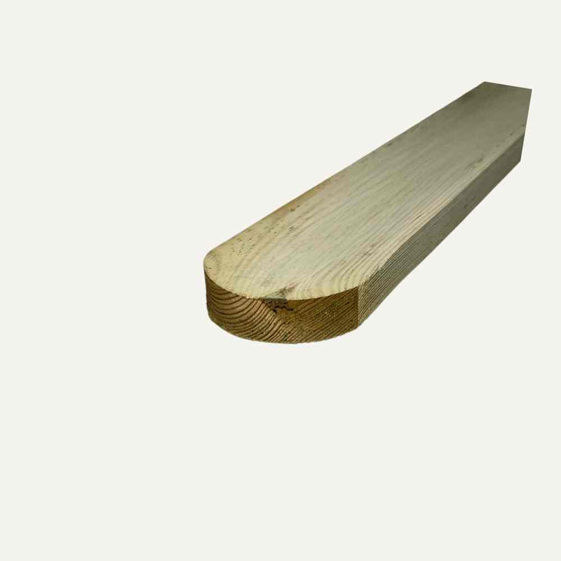 Load image into Gallery viewer, A piece of Bingley Fencing's Round Top Paling Boards PSE, measuring 3" x 3/4" (75mm x 19mm), with a rounded end and light-colored wood finish, viewed at an angle against a plain background.