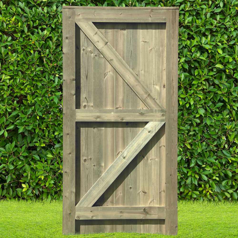 Load image into Gallery viewer, The KDM Elite Tongue & Groove Euro-Gate (ETG180), with its tongue & groove design and diagonal bracing, stands upright on a lawn against dense green foliage.