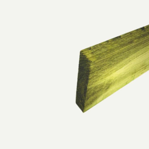 A piece of the Rail/Joist 150mm x 50mm - 6â€ x 2â€ by Bingley Fencing, green-stained and angled with a rough sawn finish, rests against a plain white background, hinting at its potential as fence building material.