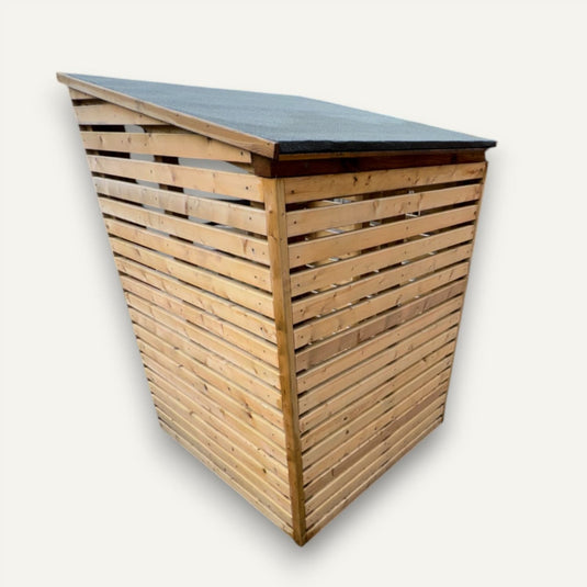 The Reduced Single Log Store with Felt Roof by Bingley Fencing features horizontal wooden slats, a solid structure, and a sloped, black felt weatherproof roof—ideal for logs or general outdoor storage. Shown on a white background.