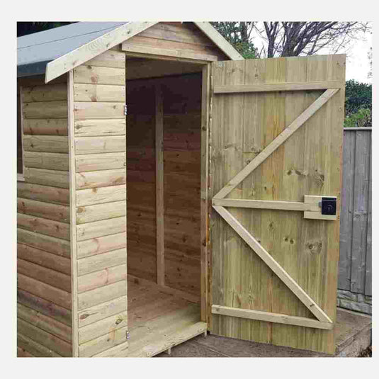 Wooden shed with single door open showing bracing and internal shed door lock