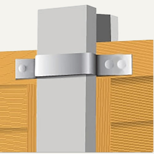 Stainless steel exhaust hood mounted on a wooden wall