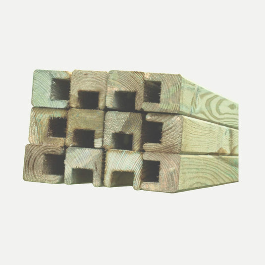 A three-by-three grid arrangement showcases nine KDM Fence Panel Repair Kit Framings featuring square hollow centers, highlighting the greenish hue of pressure-treated wood against a plain white background.