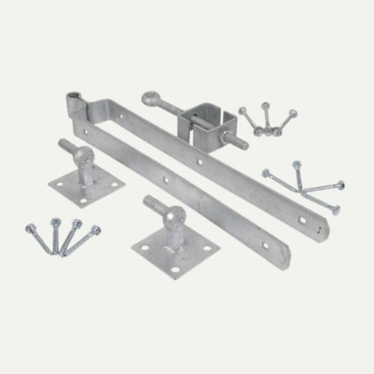 Adjustable Field Gate Hinge Set – Galvanised including a long strap hinge, two mounting plates with pins, an adjustable box hinge, and wood screws, ideal for securing wooden field gates.