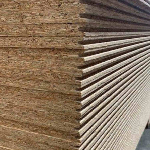 A stack of Reduced 18mm OSB Tongue & Groove Flooring Sheets by Bingley Fencing is shown side-on, displaying their layered texture and precise edges—an excellent choice for structural flooring in West Yorkshire.