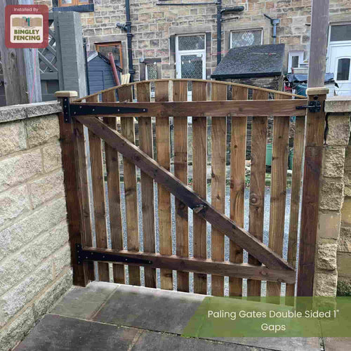 Curved wooden paling gate with auto gate latch and black t hinges