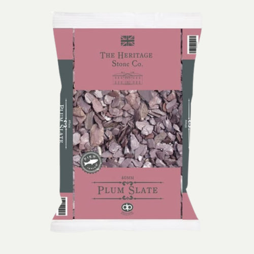 A 20kg bag of Plum Slate from The Heritage Stone Company, featuring 40mm decorative plum slate chips. The packaging displays a British flag logo and is ideal for enhancing your outdoor space.