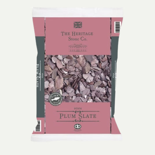 A 20kg bag of Plum Slate from The Heritage Stone Company, featuring 40mm decorative plum slate chips. The packaging displays a British flag logo and is ideal for enhancing your outdoor space.