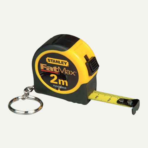 The Stanley FatMax Mini Tape Measure 2m by Stanley features a yellow and black case, metal keychain, and a partially extended tape, all shown on a light background.