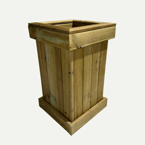 The KDM Tall Pillar Planter is a square, tall wooden planter box made from pressure-treated timber with vertical planks and wide rims at the top and base, displayed against a plain white background.