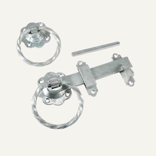 Metal door handles and lock mechanism on a white background