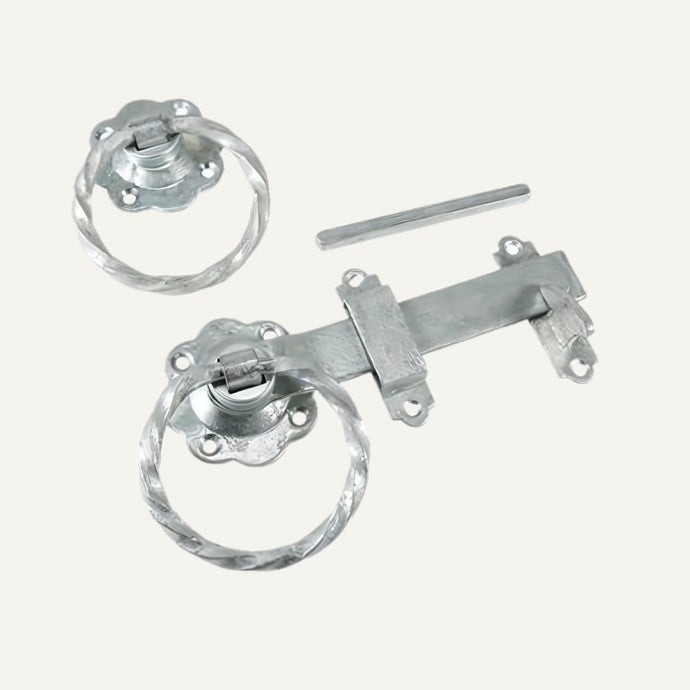 Metal door handles and lock mechanism on a white background