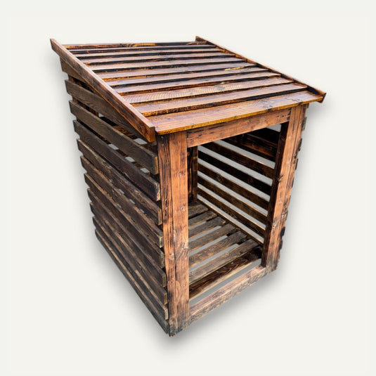 The Unique Log Store by Bingley Fencing is a dark-stained, slatted wood design with a sloping roof and open front, ensuring ventilation and easy access. Available in all sizes.