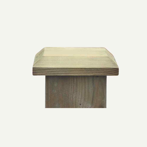 A Fence Post Cap, featuring a square chamfered top and a decorative finish, stands out against a plain light background, representing the quality of Bingley Fencing.