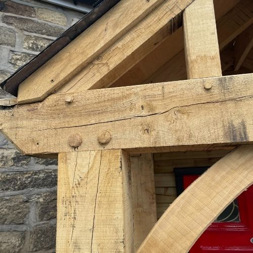 close up image of mortice and tenon joints on the custom oak porch